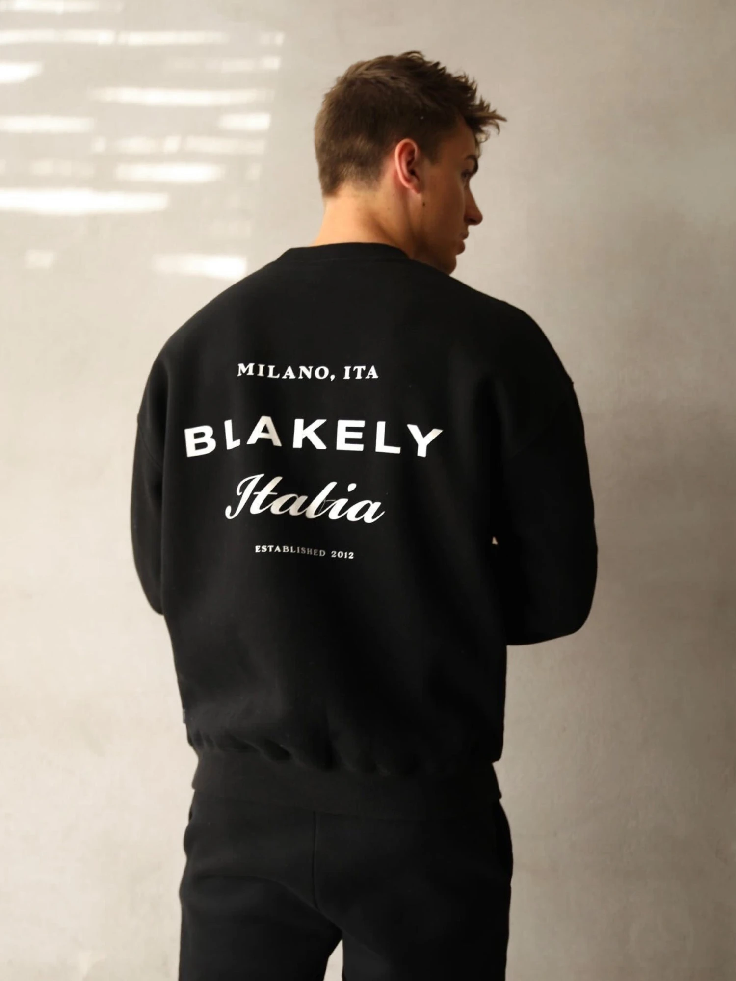 Italia Relaxed Jumper - Black 1 Italia Relaxed Jumper - Black