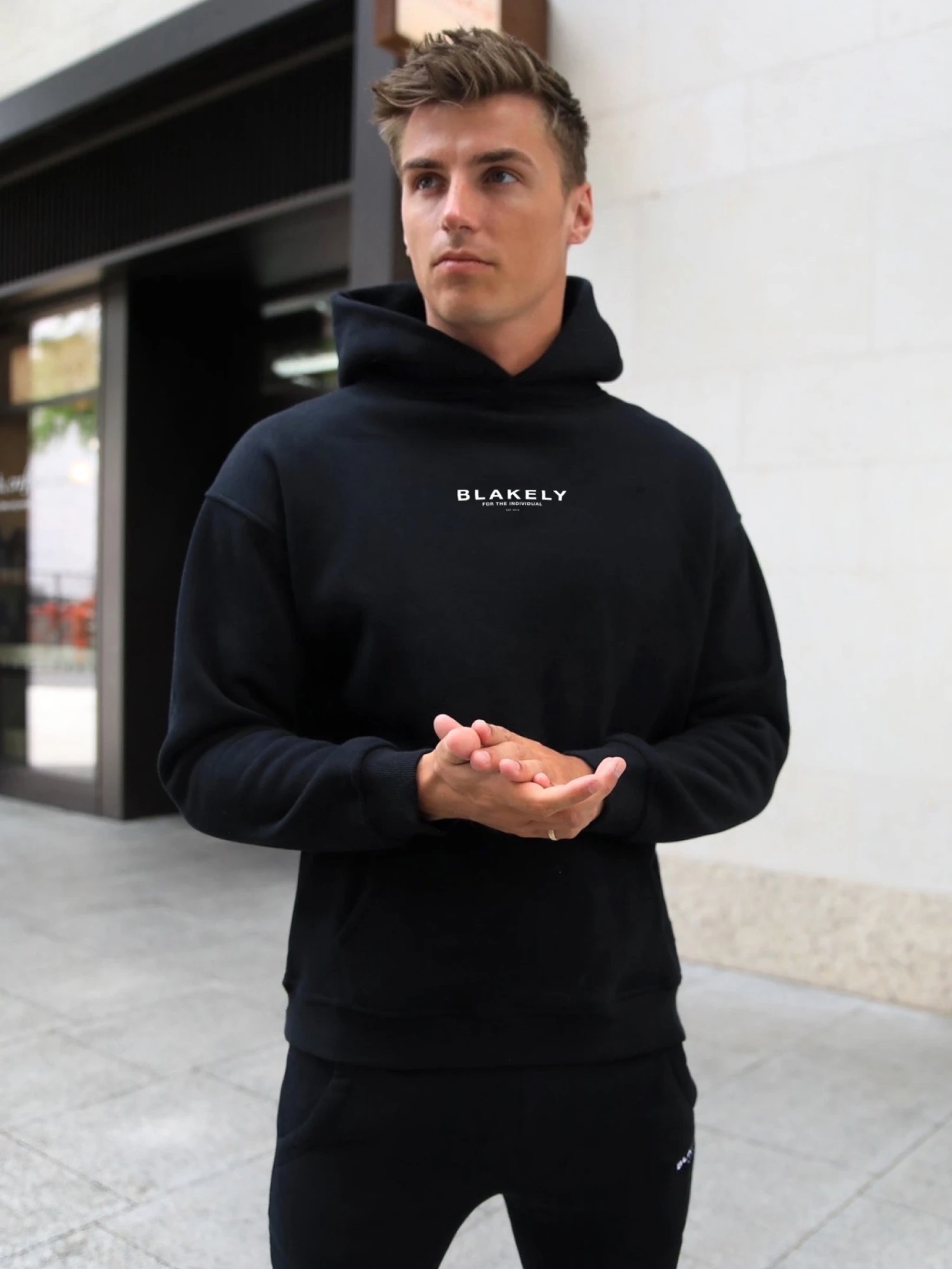 Statement Relaxed Hoodie - Black 1 Statement Relaxed Hoodie - Black
